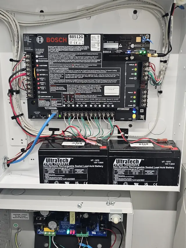 Bosch B8512G intrusion alarm control panel with cellular communicator, terminated wiring and battery backup