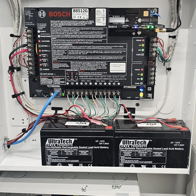 Bosch B8512G intrusion alarm control panel with cellular communicator, terminated wiring and battery backup, Tampa, FL