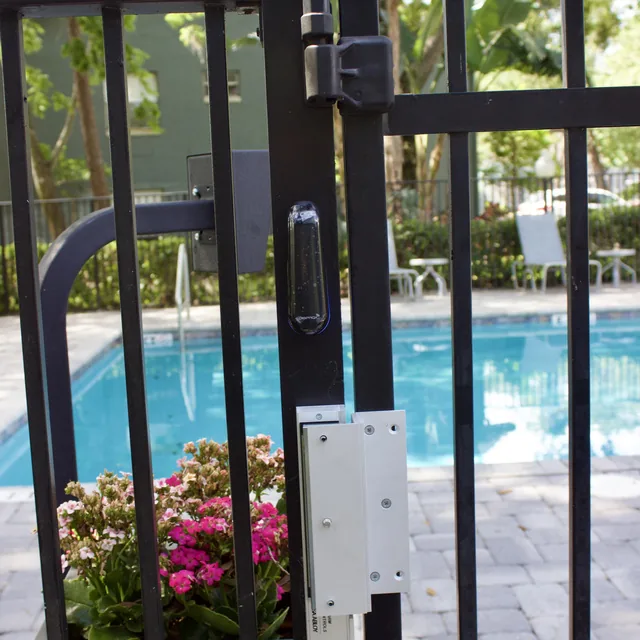 Community pool gate with magnetic lock, proximity reader and hydraulic gate closer, Orlando, FL
